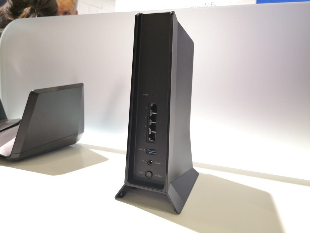 Rear view of the Netgear Nighthawk AX8, showing off the four Ethernet ports and the USB 3.0 port.