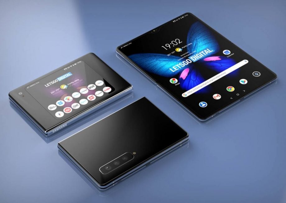 Three Samsung Galaxy Fold 2 kept on a blue background, folded front and back panel and unfolded state