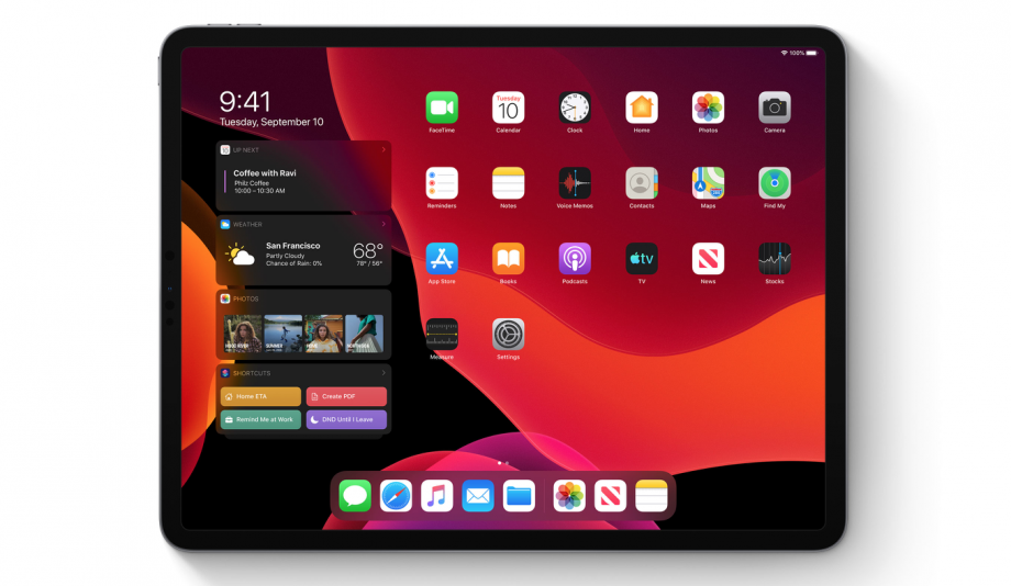 An iPad standing on white background displaying homescreen with widgets