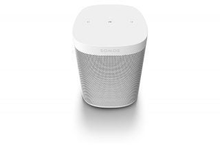 Front top view of a white Sonos One SL speaker standing on white background