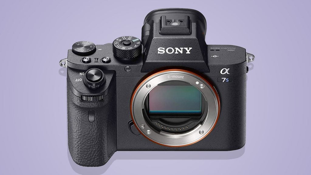 A black Sony Alpha 7s camera standing on a purple background