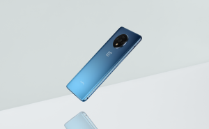 OnePlus 7TA blue One Plus 7T smartphone floating on a white background