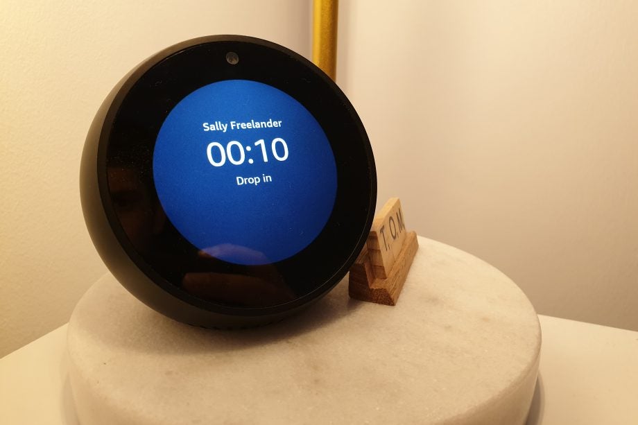 Amazon Alexa displaying Sally Freelancer Drop in with time kept on a table