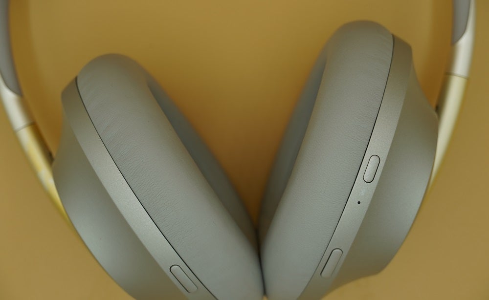 View from top, of silver-white Bose NC700 headphone's earpads
