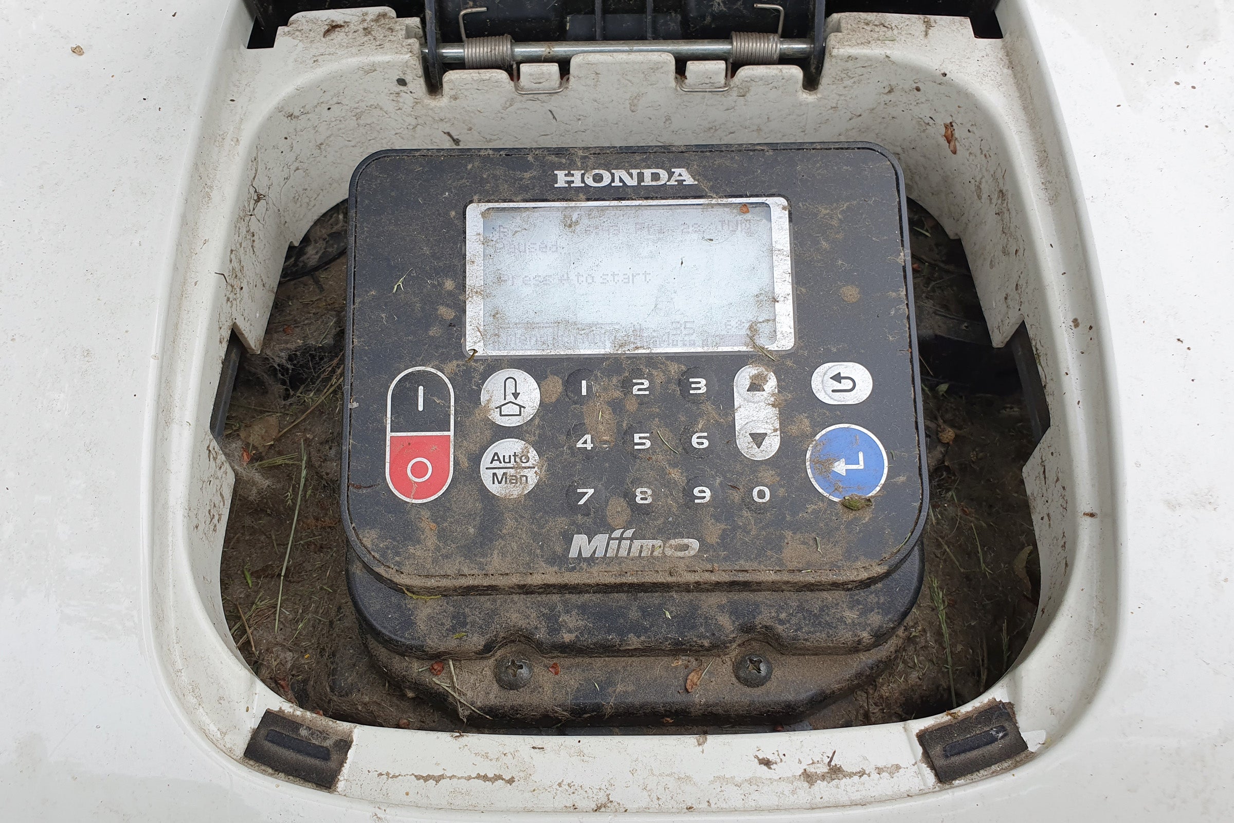 Close up view of control panel of a Honda Miimo 3000 robot lawnmower