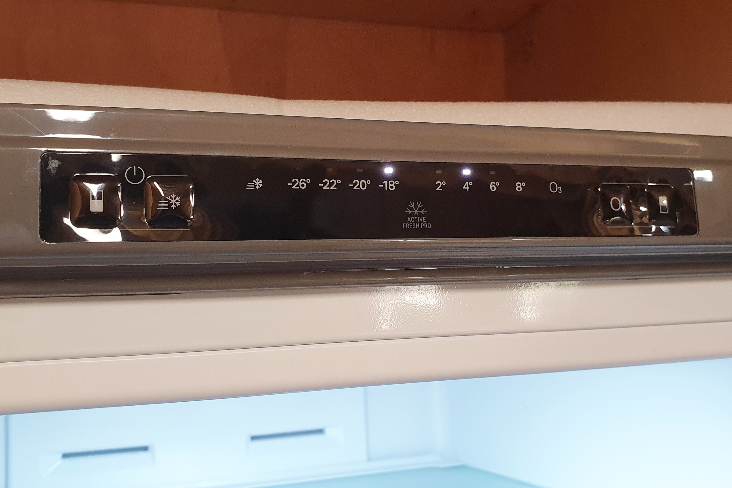 Close up view of control panel/section on top front edge of a Hotpoint 7 H7T 911A MX H AQUA Fridge Freezer