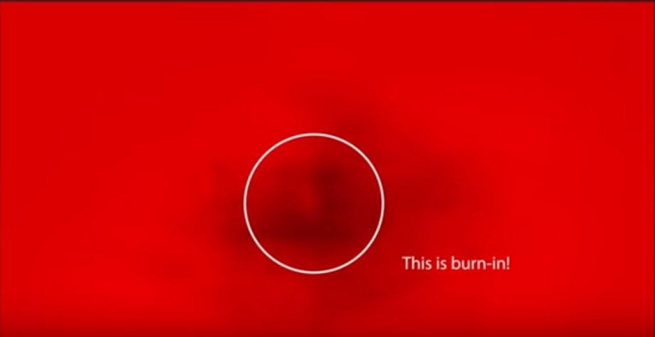 OLED TV's burn in demonstartion, a red picture with a circle highlighting a small black spot