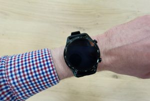 A black Huawei Watch GT 2 wore on hand