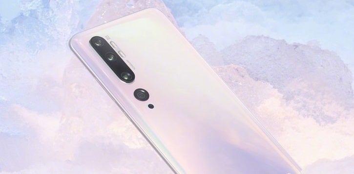 Top half back panel view of a white Mi Note 10 floating on a white background