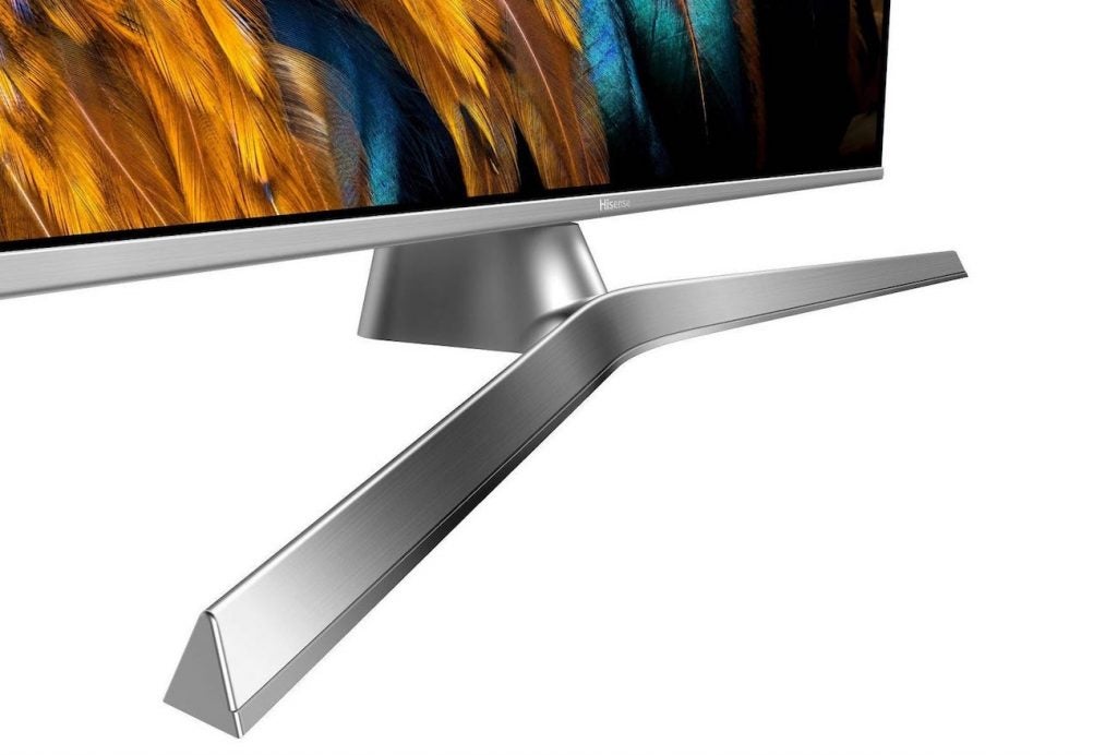 Close up image of a silver-black Hisense H55U7B TV's stand standing on a white backgroundClose up image of a silver-black Hisense H55U7B TV's stand standing on a white background
