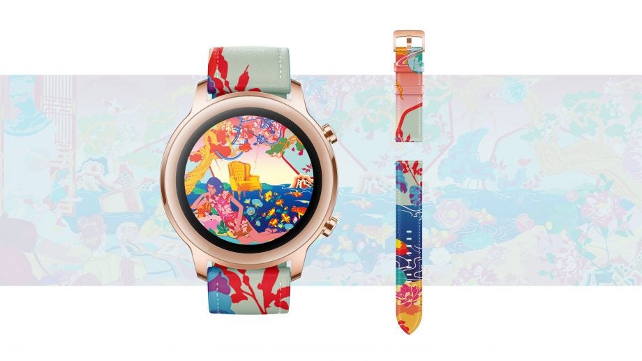 A Honor MagicWatch 2 with beach themed design standing on white background