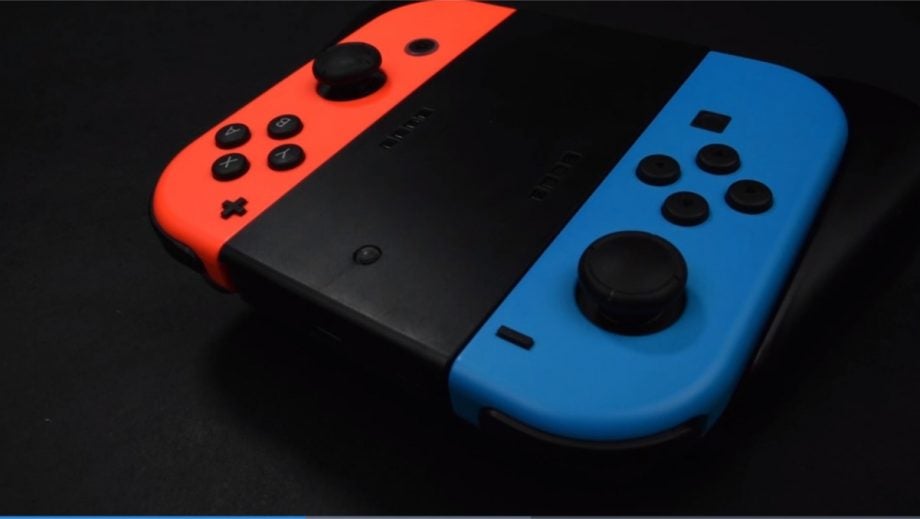 Picture of a black, blue and orange Powercast Switch's grips