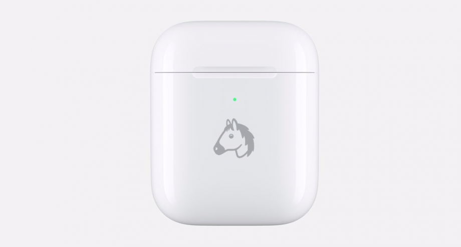 Picture of white earbuds in it's cases standing on a white background with a horse's face logo on the case