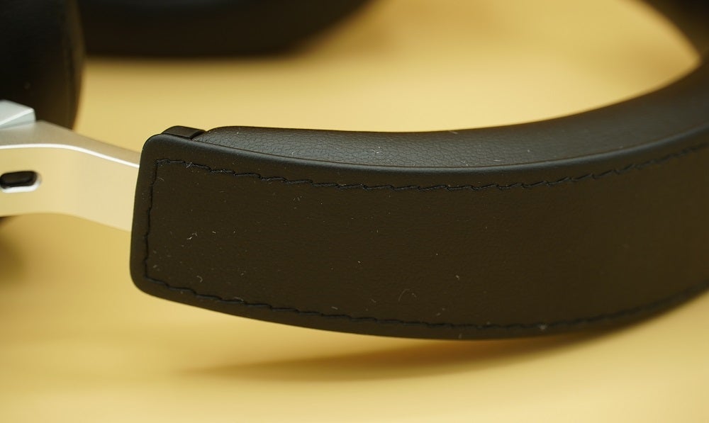 Close up image of a black Shure Aonic 50 headphone's headband