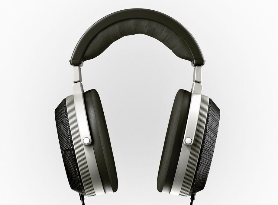 Silver-black T+A Solitaire headphones floating on a white background