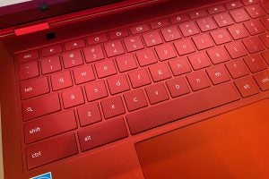 Close up picture of a red Chromebook's keyboard section
