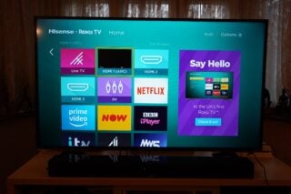clear wide hisense screen showing Roku Tv with it'sdisplayed apps