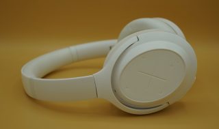 White Kygo A11 800 headphones kept on a table