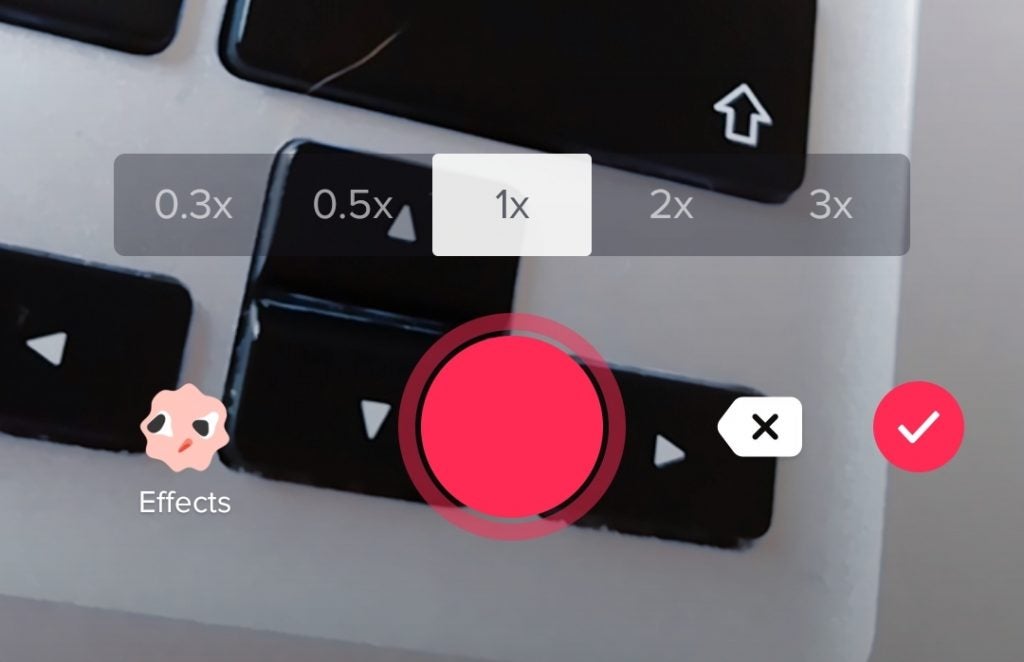 Screenshot of recording screen on TikTok with playback speed and effects options