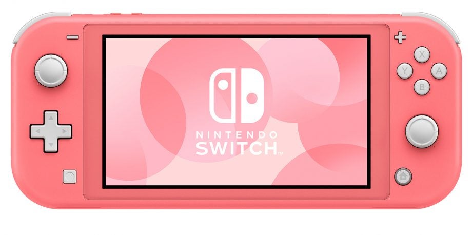 Picture of a pink Nintendo Switch standing on white background