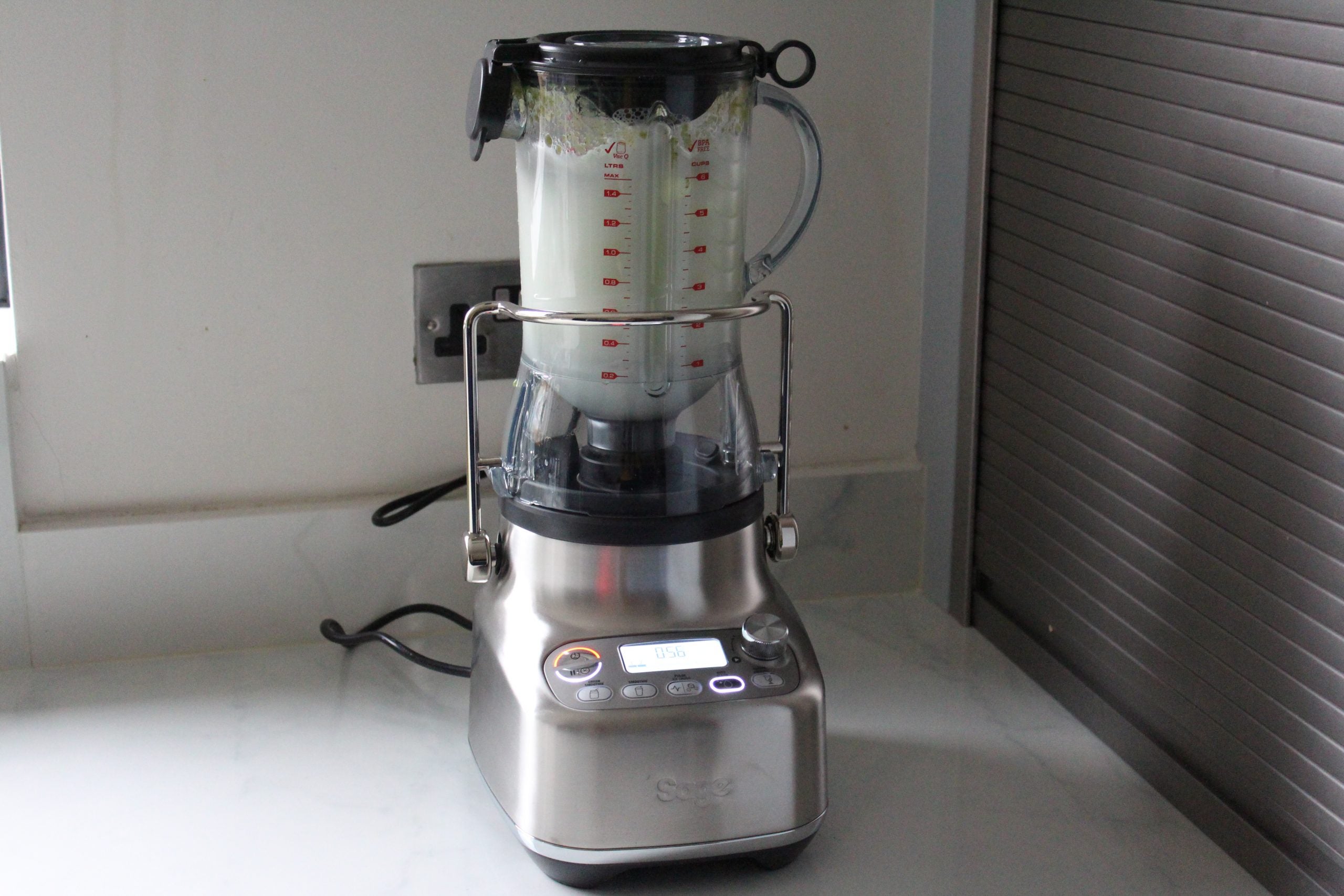 A 3X Bluicer Pro placed on a kitchen platform with a jucer jar fitted on itA 3X Bluicer Pro placed on a kitchen platform beside a juicer jar