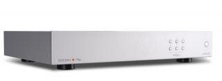 A silver Audiolab 6000N Play standing on white background