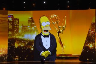 A picture of a Simpson standing displayed on a screen