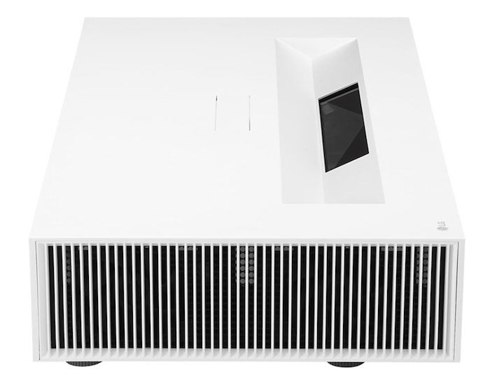 Side view of a white LG HU85LS projector kept on white background