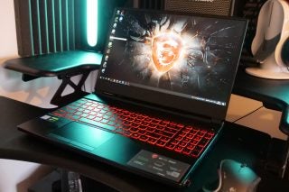 A black MSI GL65 Leopard SSD gaming laptop kept on a table
