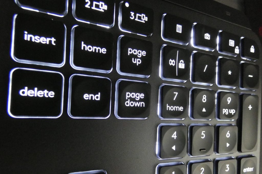 Logitech MX KeysClose up image of black Logitech MX keyboard's numpad section with light beneath the keys