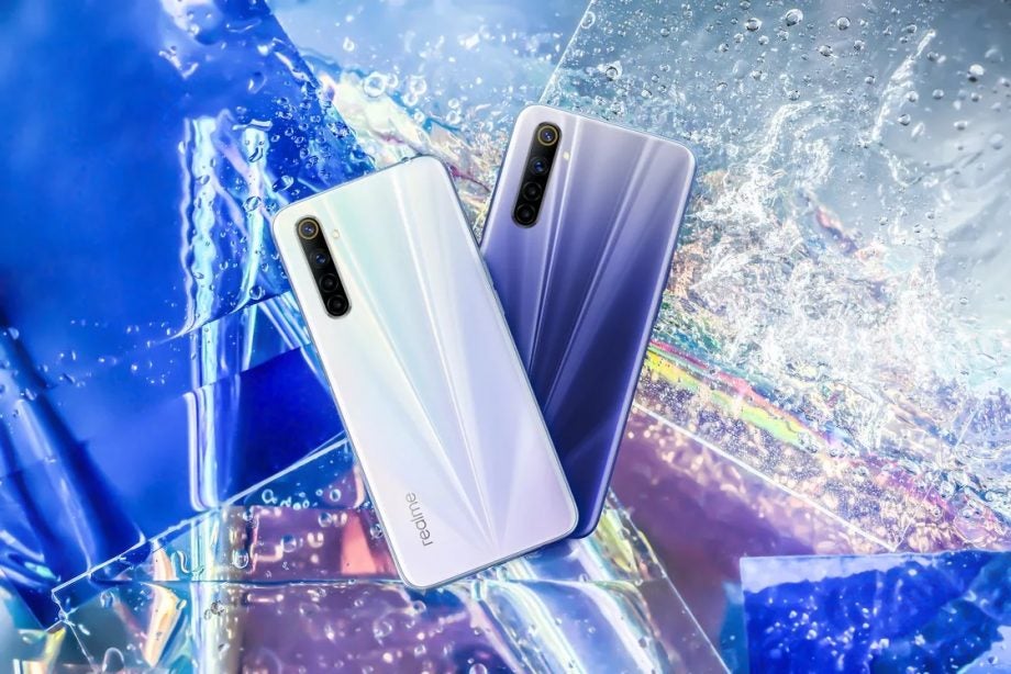 Two Realme 6 smartphone kept on a wallpaper background facing back, back panel view