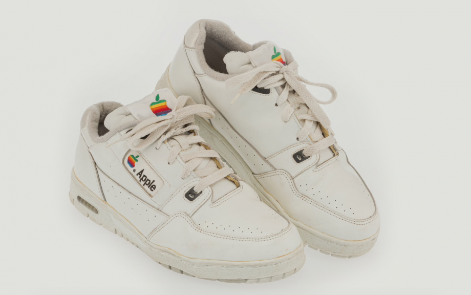 White shoes with Apple logo kept on a white background
