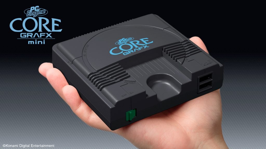 PC Engine Core Grafx MiniWallpaper of PC Engine Core Grafx mini with one of them held in hand