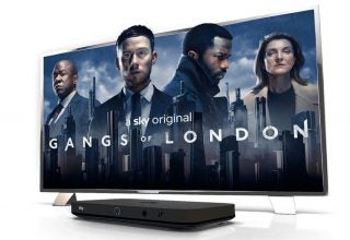 A TV and a Sky Q box standing on white background displaying Gangs of London wallpaper