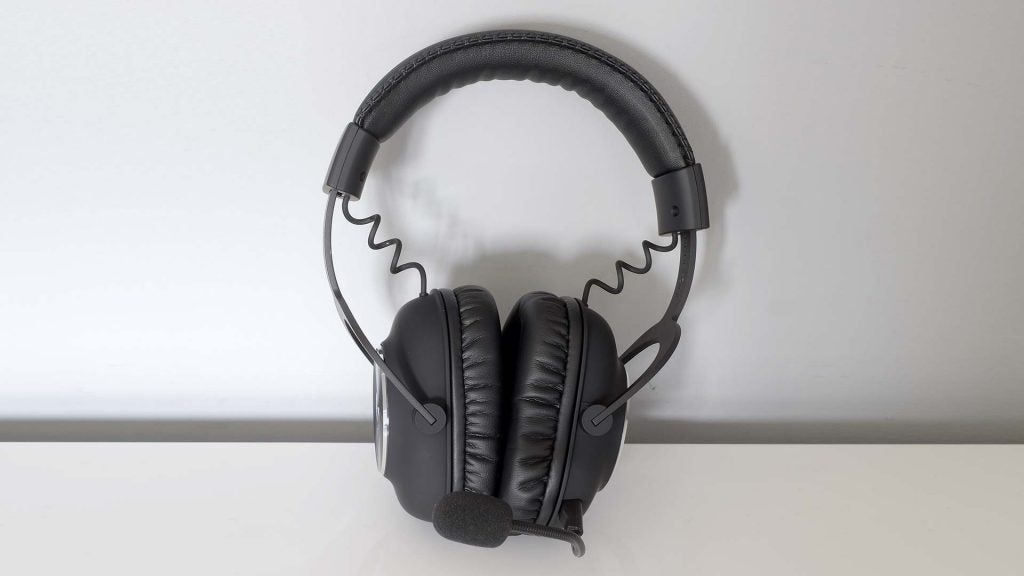 Black Logitech G Pro headphones standing on a white background