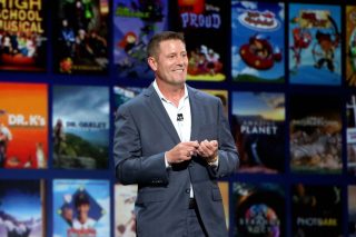 Picture of man standing on stage from Disney+ Showcase Presentation At D23 Expo Friday, August 23