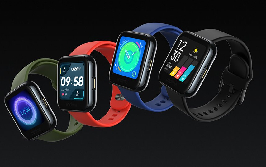 Four different colored Realme watches floating on a black background