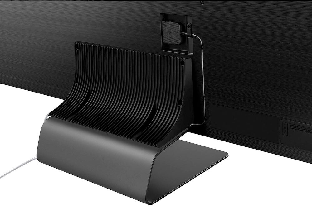 Close up image of a black Samsung QE65Q95T direct LED TV's stand