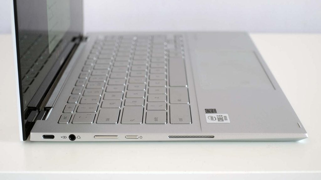 Asus Chromebook Flip C436Left side edge view of a silver Asus Chromebook C436 standing on a table