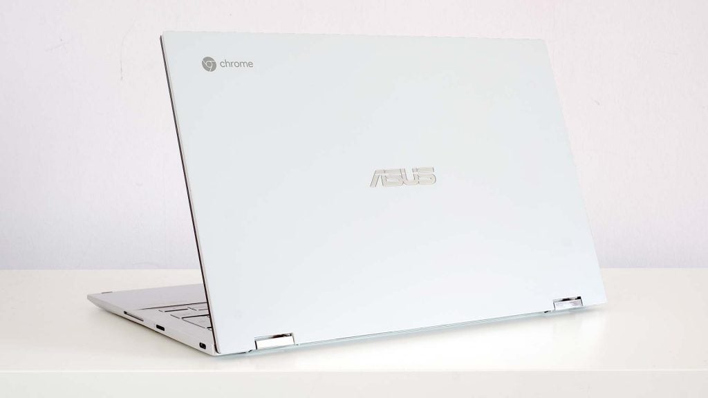 Asus Chromebook Flip C436A silver Asus Chromebook C436's screen's back panel viewA black Asus Chromebook C436 standing on white background displaying homescreen