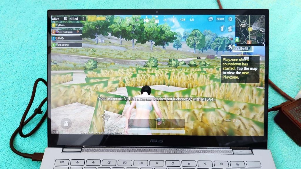 Asus Chromebook Flip C436A black Asus Chromebook C436 standing on white background displaying a scene from PUBG Mobile
