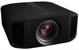 A black JVCN5 projector standing on a white background