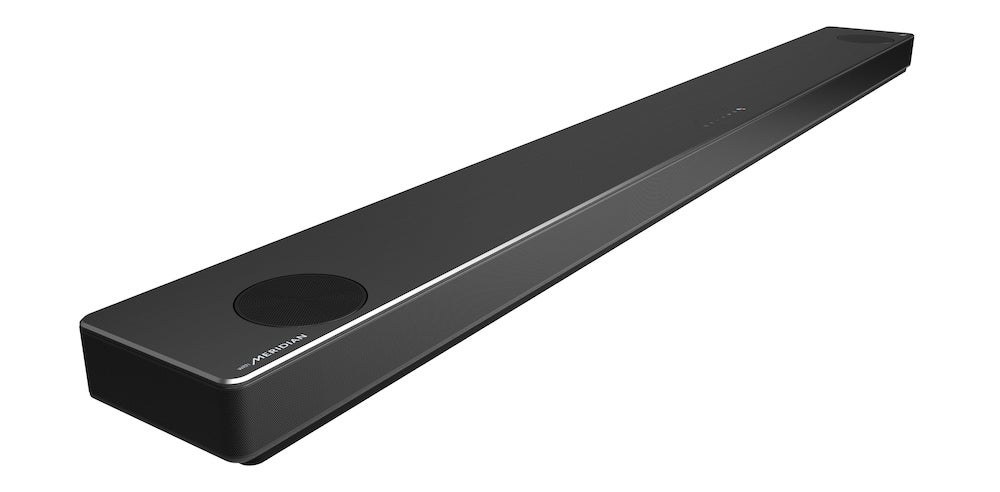 A black LG SN11RG sound bar resting on a white background