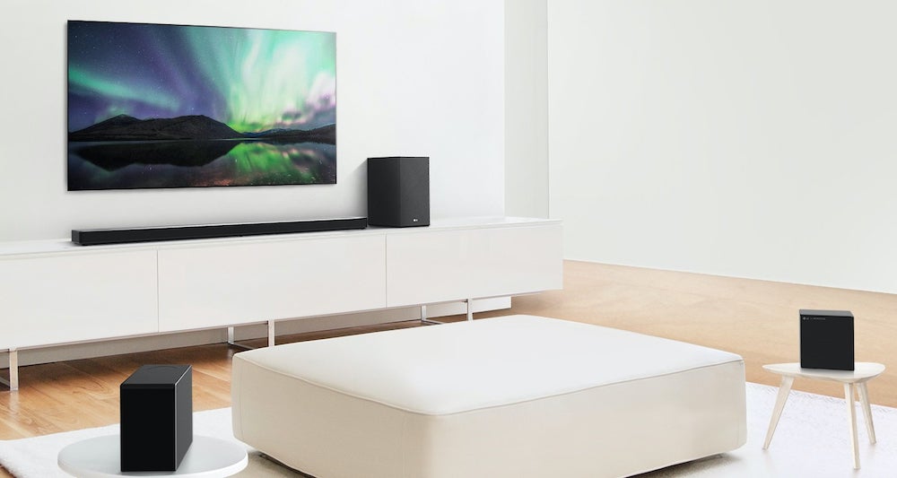 Black LG SN11RG speaker's set arranged in a living room