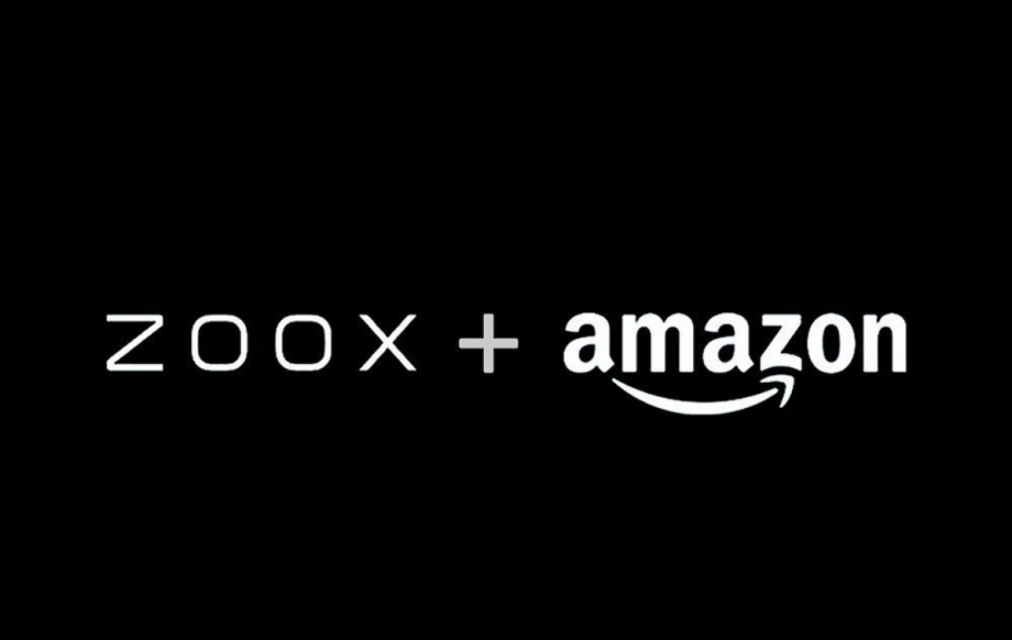 A black wallpaper with Zoox logo and Amazon logo with a plus in between