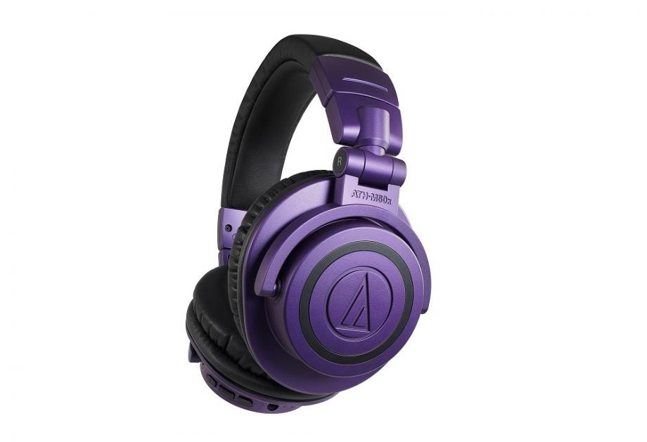 Violet-black Audio Technica ATH M50xPB headphones floating on white background