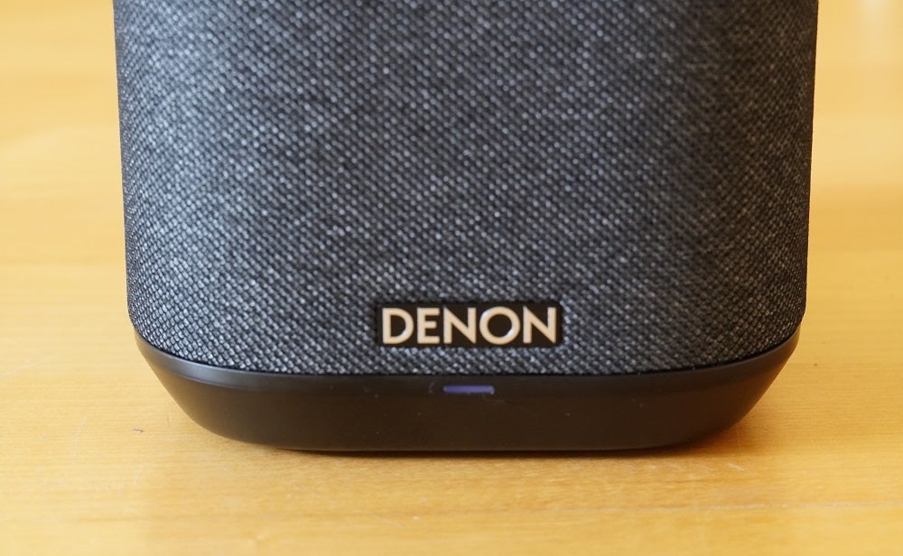 Denon Home 150Close up image of a black Denon Home 150 speaker's bottom half section