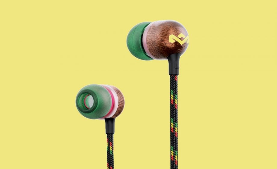 Colorful House of Marley Smile Jamaica 2 wireless earphones standing on yellow background