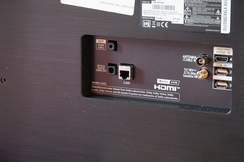 Close up image of a black LG CX TV's ports section on the back panel
