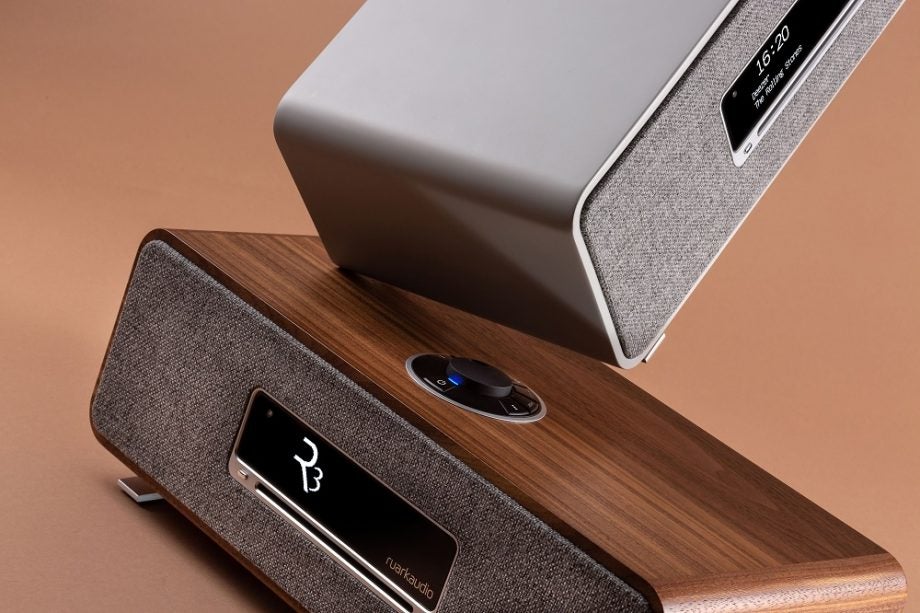 Silver-brown Ruark R3 duo music system standing on a pinkish-brown background